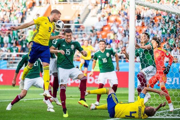 180627 Marcus Berg and Andreas Granqvist against Hector Moreno of Mexico during the FIFA World Cup group stage match between Mexico and Sweden on June 27, 2018 in Ekaterinburg Photo Joel Marklund BILDBYR N Code JM 87737  Copyright: JOELxMARKLUND BB180627JM045
