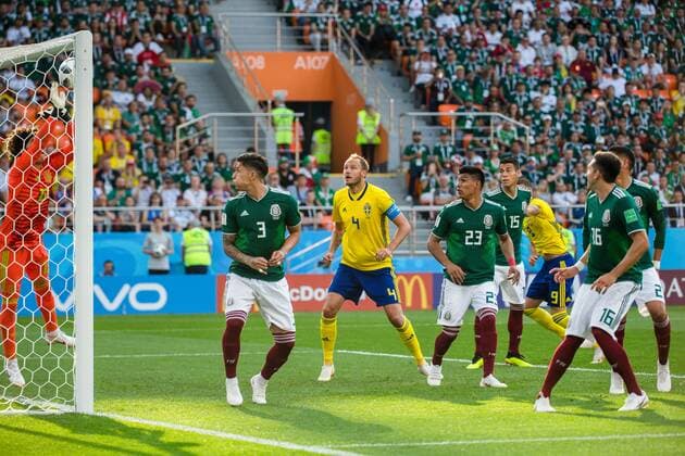 180627 goalkeeper Guillermo Ochoa of Mexico with a save in front of Andreas Granqvist of Sweden during the FIFA World Cup group stage match between Mexico and Sweden on June 27, 2018 in Ekaterinburg Photo Petter Arvidson BILDBYR N Code PA 87737  Copyright: PETTERxARVIDSON BB180627PA044
