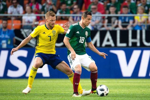 180627 Sebastian Larsson of Sweden and Andres Guardado of Mexico during the FIFA World Cup group stage match between Mexico and Sweden on June 27, 2018 in Ekaterinburg Photo Petter Arvidson BILDBYR N Code PA 87737  Copyright: PETTERxARVIDSON BB180627PA059