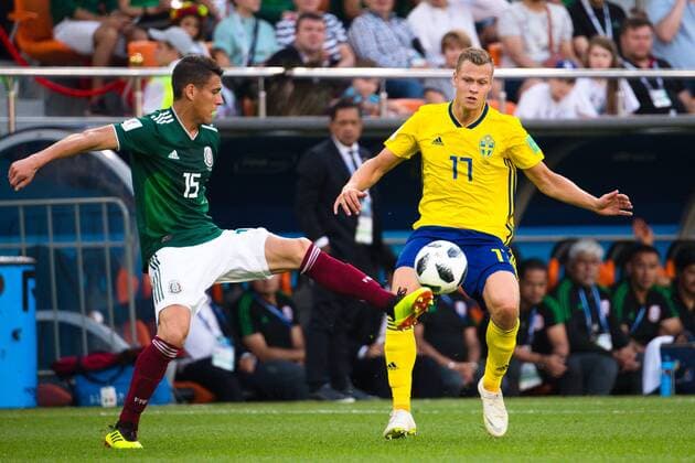180627 Hector Moreno of Mexico and Viktor Claesson of Sweden during the FIFA World Cup group stage match between Mexico and Sweden on June 27, 2018 in Ekaterinburg Photo Petter Arvidson BILDBYR N Code PA 87737  Copyright: PETTERxARVIDSON BB180627PA061