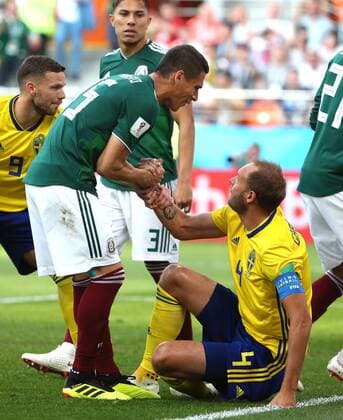 (180627) -- YEKATERINBURG, June 27, 2018 -- Hector Moreno (L front) of Mexico pulls up Andreas Granqvist of Sweden during the 2018 FIFA World Cup WM Weltmeisterschaft Fussball Group F match between Mexico and Sweden in Yekaterinburg, Russia, June 27, 2018. ) (SP)RUSSIA-YEKATERINBURG-2018 WORLD CUP-GROUP F-MEXICO VS SWEDEN LixMing 