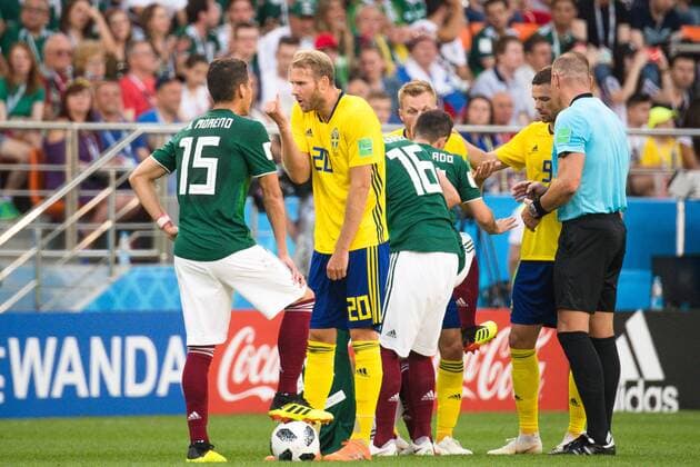 180627 Hector Moreno or Mexico and Ola Toivonen of Sweden during the FIFA World Cup group stage match between Mexico and Sweden on June 27, 2018 in Ekaterinburg Photo Petter Arvidson BILDBYR N Code PA 87737  Copyright: PETTERxARVIDSON BB180627PA071