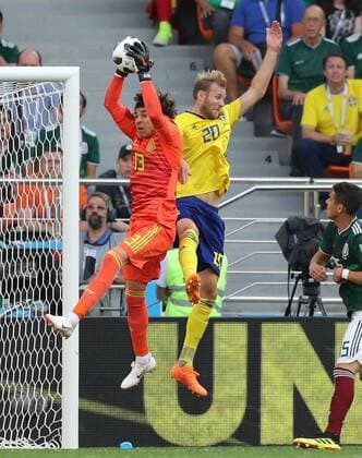 (180627) -- YEKATERINBURG, June 27, 2018 -- Goalkeeper Guillermo Ochoa (L top) of Mexico vies with Ola Toivonen (R top) of Sweden during the 2018 FIFA World Cup WM Weltmeisterschaft Fussball Group F match between Mexico and Sweden in Yekaterinburg, Russia, June 27, 2018. ) (SP)RUSSIA-YEKATERINBURG-2018 WORLD CUP-GROUP F-MEXICO VS SWEDEN LuxJinbo 
