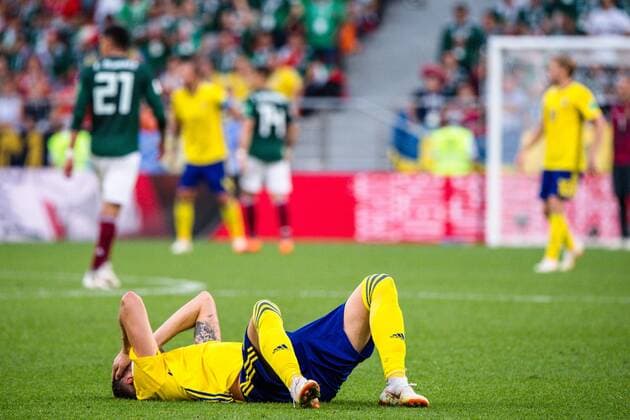 180627 Marcus Berg of Sweden in pain during the FIFA World Cup group stage match between Mexico and Sweden on June 27, 2018 in Ekaterinburg Photo Joel Marklund BILDBYR N Code JM 87737  Copyright: JOELxMARKLUND BB180627JM092