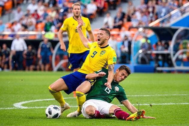 180627 Marcus Berg of Sweden against Hector Moreno of Mexico during the FIFA World Cup group stage match between Mexico and Sweden on June 27, 2018 in Ekaterinburg Photo Petter Arvidson BILDBYR N Code PA 87737  Copyright: PETTERxARVIDSON BB180627PA104