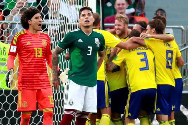 Mexican goalkeeper Ochoa (L) and Mexican defender Carlos Salcedo (2L) during the FIFA World Cup WM Weltmeisterschaft Fussball 2018 Group F soccer match between Mexico and Sweden, in Ekaterinburg, Russia, 27 June 2018. MEXICO VS. SWEDEN !ACHTUNG: NUR REDAKTIONELLE NUTZUNG!  Copyright: xJosexMendezx FWC42-139 20180627-636657181157958710