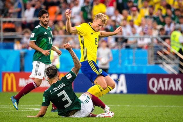 180627 Carlos Salcedo of Mexico and Oscar Hiljemark of Sweden during the FIFA World Cup group stage match between Mexico and Sweden on June 27, 2018 in Ekaterinburg Photo Petter Arvidson BILDBYR N Code PA 87737  Copyright: PETTERxARVIDSON BB180627PA129