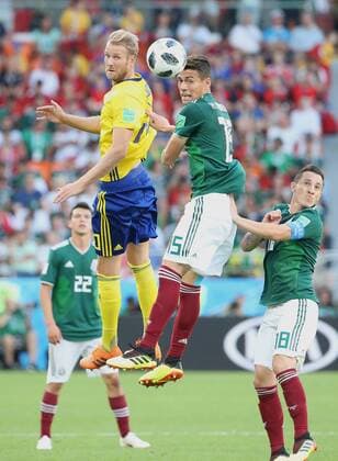 (180627) -- YEKATERINBURG, June 27, 2018 -- Ola Toivonen (L top) of Sweden vies with Hector Moreno (R top) of Mexico during the 2018 FIFA World Cup WM Weltmeisterschaft Fussball Group F match between Mexico and Sweden in Yekaterinburg, Russia, June 27, 2018. ) (SP)RUSSIA-YEKATERINBURG-2018 WORLD CUP-GROUP F-MEXICO VS SWEDEN LixMing 