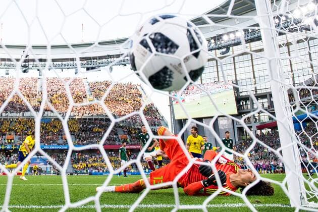 180627 Andreas Granqvist of Sweden scores 0 2 from the penalty spot behind goalkeeper Guillermo Ochoa of Mexico during the FIFA World Cup group stage match between Mexico and Sweden on June 27, 2018 in Ekaterinburg Photo Petter Arvidson BILDBYR N Code PA 87737  Copyright: PETTERxARVIDSON BB180627PA152