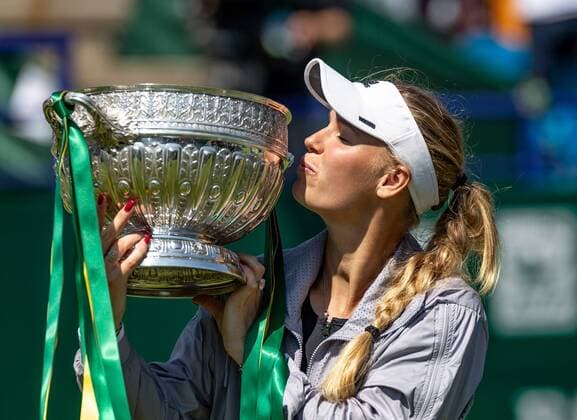 Caroline Wozniacki celebrates her victory holding the trophy during the Nature Valley Eastbourne International Women s Single Final between Caroline Wozniacki (Denmark) and Aryna Sabalenka (Belarus) at Devonshire Park Lawn Tennis Club, Eastbourne, England on 30th June 2018. Copyright: xLiamxMcAvoyx 20300141