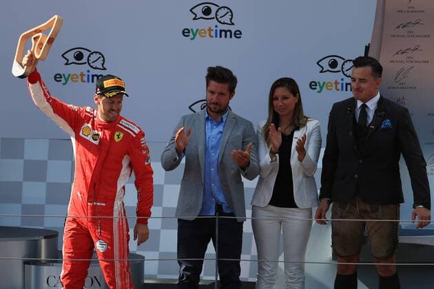 1st July 2018, Red Bull Ring, Spielberg, Austria; Austrian Formula One Grand Prix, Sunday race day; Scuderia Ferrari, Sebastian Vettel takes the 3rd placed trophy  ActionPlus12043214 Octane