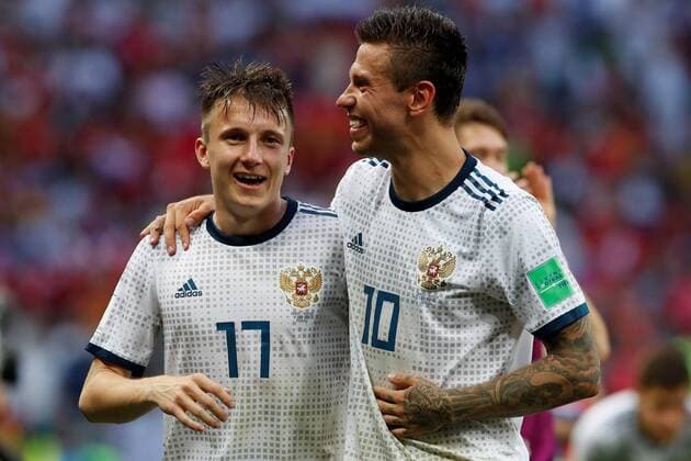Russian midfielder Aleksandr Golovin (L) and Russian forward Fedor Smolov celebrate at the end of the FIFA World Cup WM Weltmeisterschaft Fussball 2018 round of 16 soccer match between Spain and Russia, at Luzhniki Stadium in Moscu, Russia, 1 July 2018. SPAIN VS. RUSSIA !ACHTUNG: NUR REDAKTIONELLE NUTZUNG!  Copyright: xAlbertoxEstevezx FWC51-433 20180701-636660688994457406