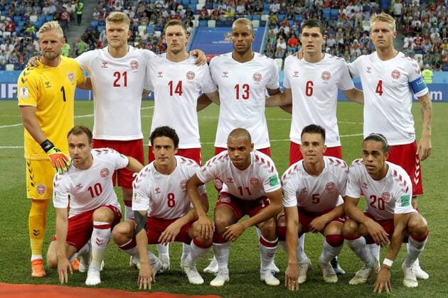 NIZHNY NOVGOROD, RUSSIA - JULY 1, 2018: Denmark s Christian Eriksen, Thomas Delaney, Martin Braithwaite, Jonas Knudsen, Yussuf Poulsen (L-R front), goalkeeper Kasper Schmeichel, Andreas Cornelius, Henrik Dalsgaard, Mathias Joergensen, Andreas Christensen and Simon Kjaer (L-R background) pose for a group photograph ahead of the 2018 FIFA World Cup WM Weltmeisterschaft Fussball Round of 16 football match against Croatia at Nizhny Novgorod Stadium. Mikhail Japaridze TASS TS087739