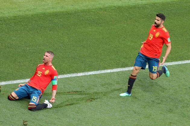 1st July 2018, Luzhniki Stadium, Moscow, Russia; FIFA World Cup WM Weltmeisterschaft Fussball Football, Round of 16, Spain versus Russia; Sergio Ramos celebrates as his pressure means that Russia scored an own goal, chased by Diego Costa  ActionPlus12043356 PierrexTeyssot