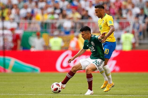 Brazil vs. Mexico SAMARA, SA - 02.07.2018: BRAZIL VS. MEXICO - Hirving Lozano of Mexico fights with Neymar Jr. of Brazil during the match between Brazil and Mexico valid for the eighth round of the 2018 World Cup held at the Samara Arena in Samara, Russia. (Photo: Marcelo Machado de Melo Fotoarena) x1560477x  MarceloxMachadoxdexMelo