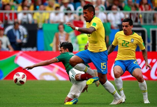Mexican forward Vela (L) fights for the ball with Brazilian midfielder Paulinho (C) and Brazilian defender Fagner during the FIFA World Cup WM Weltmeisterschaft Fussball 2018 round of 16 soccer match between Brazil and Mexico, at Samara Arena in Samara, Russia, 2 July 2018. BRAZIL VS. MEXICO !ACHTUNG: NUR REDAKTIONELLE NUTZUNG!  Copyright: xJosexMendezx FWC53-98 20180702-636661452776232890