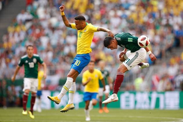 Brazil vs. Mexico SAMARA, SA - 02.07.2018: BRAZIL VS. MEXICO - Neymar Jr. of Brazil plays the ball with Edson Alvarez of Mexico during the match between Brazil and Mexico valid for the round of 16 of the 2018 World Cup held at the Samara Arena in Samara, Russia. (Photo: Marcelo Machado de Melo Fotoarena) x1560478x  MarceloxMachadoxdexMelo