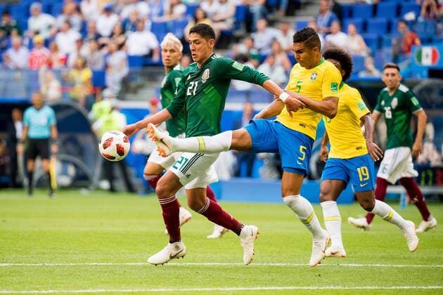 180702 Edson Alvarez of Mexico and Casemiro of Brazil during the FIFA World Cup round of 16 match between Brazil and Mexico on July 2, 2018 in Samara Photo Petter Arvidson BILDBYRAN Code PA 92081  Copyright: PETTERxARVIDSON BB180702PA057