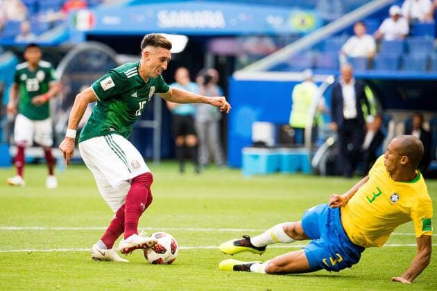 180702 Hector Herrera of Mexico and Miranda of Brazil during the FIFA World Cup round of 16 match between Brazil and Mexico on July 2, 2018 in Samara Photo Petter Arvidson BILDBYRAN Code PA 92081  Copyright: PETTERxARVIDSON BB180702PA061