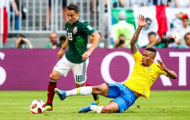 SAMARA, RUSSIA - JULY 2, 2018: Mexicoâ€™s Andres Guardado (L) and Brazilâ€™s Gabriel Jesus in their 2018 FIFA World Cup WM Weltmeisterschaft Fussball Round of 16 match at Samara Arena Stadium. Sergei Bobylev TASS  TS08795E