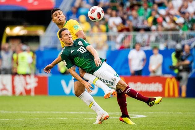 180702 Andres Guardado of Mexico and Casemiro of Brazil during the FIFA World Cup round of 16 match between Brazil and Mexico on July 2, 2018 in Samara Photo Petter Arvidson BILDBYRAN Code PA 92081  Copyright: PETTERxARVIDSON BB180702PA078