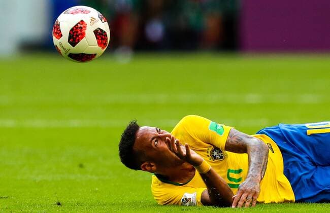 SAMARA, RUSSIA - JULY 2, 2018: Brazilâ€™s Neymar handles Telstar Mechta, the official match ball, in their 2018 FIFA World Cup WM Weltmeisterschaft Fussball Round of 16 match against Mexico at Samara Arena Stadium. Sergei Savostyanov TASS  TS087969