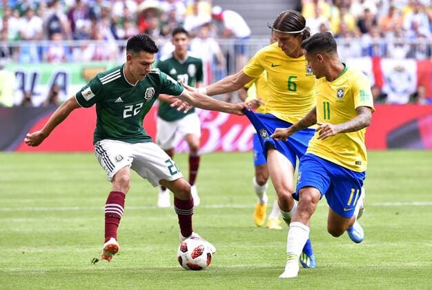(180702) -- SAMARA, July 2, 2018 -- Filipe Luis (2nd R) of Brazil vies with Hirving Lozano (L) of Mexico during the 2018 FIFA World Cup WM Weltmeisterschaft Fussball round of 16 match between Brazil and Mexico in Samara, Russia, July 2, 2018. ) (SP)RUSSIA-SAMARA-2018 WORLD CUP-ROUND OF 16-BRAZIL VS MEXICO ChenxYichen 