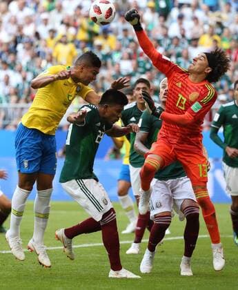 (180702) -- SAMARA, July 2, 2018 -- Goalkeeper Guillermo Ochoa (1st R) of Mexico vies with Casemiro (1st L) of Brazil during the 2018 FIFA World Cup WM Weltmeisterschaft Fussball round of 16 match between Brazil and Mexico in Samara, Russia, July 2, 2018. ) (SP)RUSSIA-SAMARA-2018 WORLD CUP-ROUND OF 16-BRAZIL VS MEXICO LixMing 