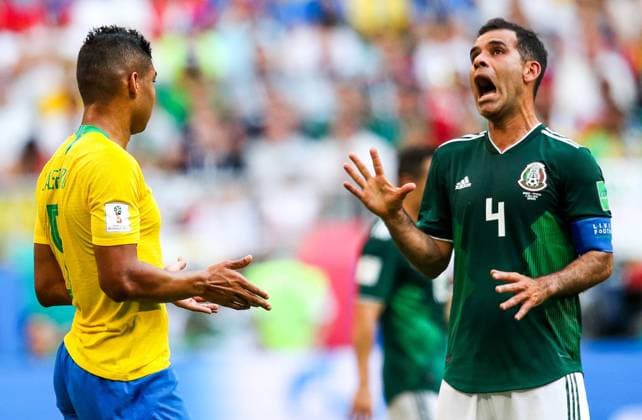SAMARA, RUSSIA - JULY 2, 2018: Brazilâ€™s Casemiro (L) and Mexicoâ€™s Rafael Marquez in their 2018 FIFA World Cup WM Weltmeisterschaft Fussball Round of 16 match at Samara Arena Stadium. Sergei Bobylev TASS  TS087971