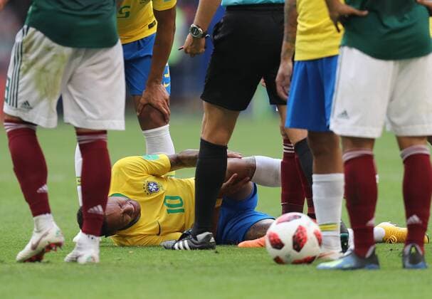 (180702) -- SAMARA, July 2, 2018 -- Neymar (bottom) of Brazil sustains injury during the 2018 FIFA World Cup WM Weltmeisterschaft Fussball round of 16 match between Brazil and Mexico in Samara, Russia, July 2, 2018. ) (SP)RUSSIA-SAMARA-2018 WORLD CUP-ROUND OF 16-BRAZIL VS MEXICO LuxJinbo 