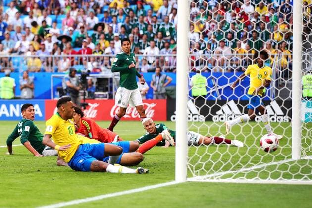Neymar of Brazil scores his side s opening goal during the 2018 FIFA World Cup WM Weltmeisterschaft Fussball Round of 16 match at Samara Arena in Samara, Russia on July 2, 2018. Brazil beat Mexico 2-0 to qualify for the quarter-finals.  SAM20180702101 CHRISxBRUNSKILL