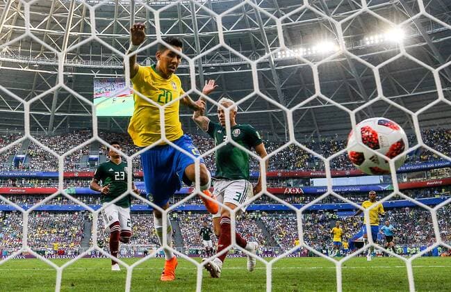 SAMARA, RUSSIA - JULY 2, 2018: Brazilâ€™s Roberto Firmino (C) scores against Mexico in their 2018 FIFA World Cup WM Weltmeisterschaft Fussball Round of 16 match at Samara Arena Stadium; Brazil wins 2-0. Sergei Bobylev TASS  TS087A01