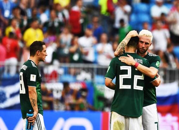 Sport - Bilder des Tages Players of Mexico hug to comfort others after being defeated by Brazil in their Round of 16 match during the 2018 FIFA World Cup WM Weltmeisterschaft Fussball in Samara, Russia, 2 July 2018. Brazil has roared into the World Cup quarter-finals with a 2-0 victory over Mexico as Neymar shone with a goal and an assist that dumped the central Americans out at the last 16 stage for the seventh straight occasion. The PSG forward slid home in the second half and then teed up Roberto Firmino late on as the five-times champions beat an otherwise stubborn Mexico, whose World Cup began with such promise with a victory over champions Germany, but ended in familiar fashion in the first knockout round. Brazil beats Mexico 2-0 to progress as Neymar shows his brilliant best and frustrating worst  20180703_42305