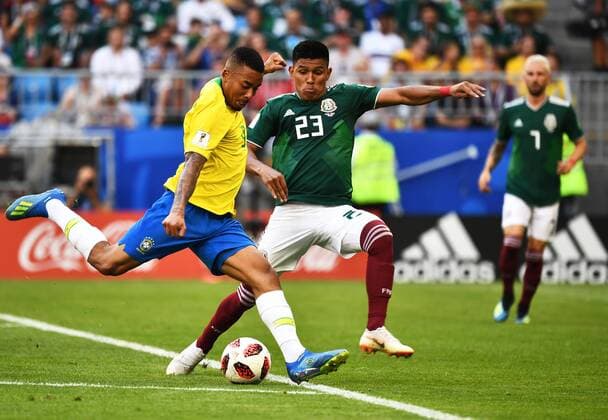 Gabriel Jesus of Brazil, left, challenges Jesus Gallardo of Mexico in their Round of 16 match during the 2018 FIFA World Cup WM Weltmeisterschaft Fussball in Samara, Russia, 2 July 2018. Brazil has roared into the World Cup quarter-finals with a 2-0 victory over Mexico as Neymar shone with a goal and an assist that dumped the central Americans out at the last 16 stage for the seventh straight occasion. The PSG forward slid home in the second half and then teed up Roberto Firmino late on as the five-times champions beat an otherwise stubborn Mexico, whose World Cup began with such promise with a victory over champions Germany, but ended in familiar fashion in the first knockout round. Brazil beats Mexico 2-0 to progress as Neymar shows his brilliant best and frustrating worst  20180703_42308