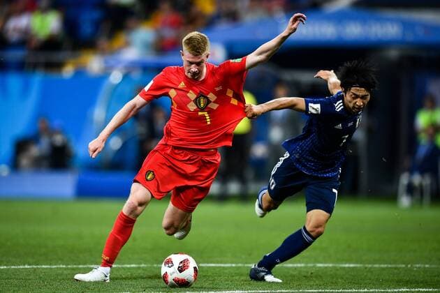 Kevin De Bruyne of Belgium, left, challenges Gaku Shibasaki of Japan in their Round of 16 match during the 2018 FIFA World Cup WM Weltmeisterschaft Fussball in Rostov, Russia, 2 July 2018. Belgium threw caution to the wind to reach the World Cup quarter-finals as substitute Nacer Chadli scored in the dying seconds against Japan to snatch a 3-2 comeback win and set up a clash with five-time champions Brazil. The distraught Japanese, who went 2-0 up with goals by Genki Haraguchi and Takashi Inui early in the second half, fell to the turf after Chadli poked the ball home from Thomas Meunier s cross four minutes into added time at the Rostov Arena. Belgium downs Japan with Nacer Chadli s injury time goal capping historic comeback  20180703_67309