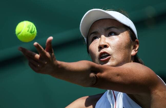 (180703) -- LONDON, July 3, 2018 -- Peng Shuai of China serves during the women s singles first round match against Samantha Stosur of Australia at the Championship Wimbledon 2018 in London, Britain, on July 3, 2018. Samantha Stosur won 2-0. ) (SP)BRITAIN-LONDON-TENNIS-WIMBLEDON-DAY 2 TangxShi 