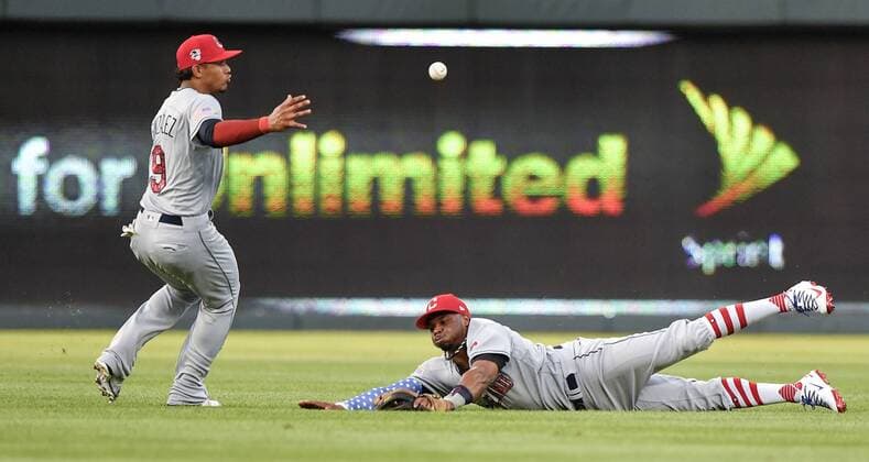July 3, 2018 - Kansas City, MO, USA - Cleveland Indians center fielder Rajai Davis dives and misses as second baseman Erik Gonzalez reaches for an RBI single by the Kansas City Royals Whit Merrifield in the second inning on Tuesday, July 3, 2018, at Kauffman Stadium in Kansas City, Mo. Cleveland at Kansas City - ZUMAm67_ 20180703_zaf_m67_034 Copyright: xJohnxSleezerx