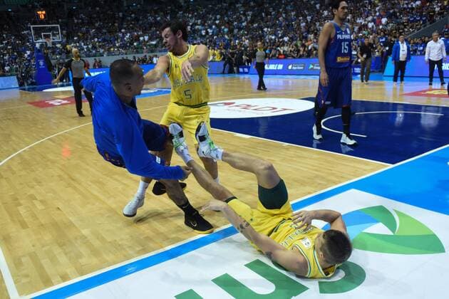 July 2, 2018 - Biulcan, Philippines - Players from benches run to their teammates who figured in a brawl during the match between Australia and the Philippines for the FIBA Asian Qualifiers held at the Philippine Arena in the province of Bulacan, north of Manila in 02 July 2018. Australia beat the Philippines by default following a brawl in the third quarter that shocked basketball fans all over the world. Philippines v Australia - FIBA Asian Qualifiers  - ZUMAn230 20180702_zaa_n230_320 Copyright: xGeorgexCalvelox