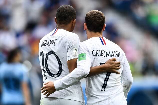 Sport-Bilder des Tages Kylian Mbappe, left, and Antoine Griezmann of France celebrate after scoring against Uruguay in their quarterfinal match during the 2018 FIFA World Cup WM Weltmeisterschaft Fussball in Nizhny Novgorod, Russia, 6 July 2018. Raphael Varane and Antoine Griezmann struck either side of halftime as France earned a World Cup semifinal berth with a 2-0 victory over Uruguay here on Friday (6 July 2018). Varane sent a glancing header into the bottom corner after a Griezmann set piece before the Atletico Madrid forward saw his long-range 61st-minute strike slip through the hands of Uruguay goalkeeper Fernando Muslera. France have now set up a semifinal clash against the winner of Friday s other quarterfinal between Brazil and Belgium. We knew that their defenders are very strong in the air so we tried to put tall players up front and give them trouble, Griezmann said after the match. We knew we didn t have to accept their style. We had to stay positive. It was Uruguay s first defeat of the tournament and marked only the second time out of seven that they have lost a World Cup quarterfinal. Celeste coach Oscar Tabarez admitted that France were the stronger team and deserved to win. We were lacking what all teams lack when they lose, he said. We didn t play as well as our rivals. We really made a huge physical effort in the first 20 minutes but then we weren t able to exploit the chances that we had. Then they scored and that had a huge impact. France beat Uruguay 2-0 to secure World Cup semifinal spot  20180706_10886