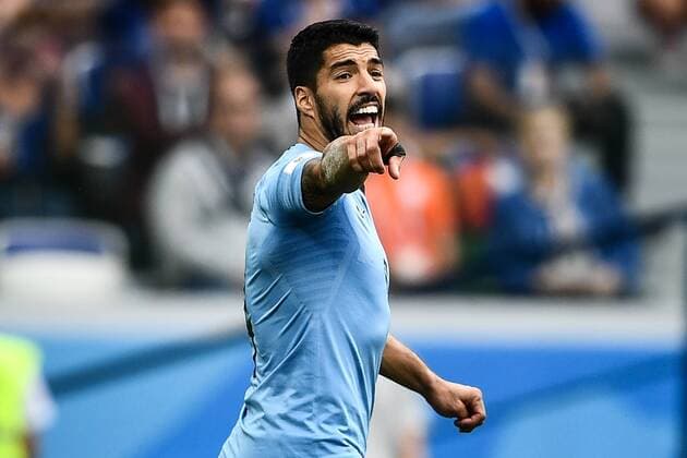 Sport-Bilder des Tages Luis Suarez of Uruguay reacts as he competes against France in their quarterfinal match during the 2018 FIFA World Cup WM Weltmeisterschaft Fussball in Nizhny Novgorod, Russia, 6 July 2018. Raphael Varane and Antoine Griezmann struck either side of halftime as France earned a World Cup semifinal berth with a 2-0 victory over Uruguay here on Friday (6 July 2018). Varane sent a glancing header into the bottom corner after a Griezmann set piece before the Atletico Madrid forward saw his long-range 61st-minute strike slip through the hands of Uruguay goalkeeper Fernando Muslera. France have now set up a semifinal clash against the winner of Friday s other quarterfinal between Brazil and Belgium. We knew that their defenders are very strong in the air so we tried to put tall players up front and give them trouble, Griezmann said after the match. We knew we didn t have to accept their style. We had to stay positive. It was Uruguay s first defeat of the tournament and marked only the second time out of seven that they have lost a World Cup quarterfinal. Celeste coach Oscar Tabarez admitted that France were the stronger team and deserved to win. We were lacking what all teams lack when they lose, he said. We didn t play as well as our rivals. We really made a huge physical effort in the first 20 minutes but then we weren t able to exploit the chances that we had. Then they scored and that had a huge impact. France beat Uruguay 2-0 to secure World Cup semifinal spot  20180706_72526