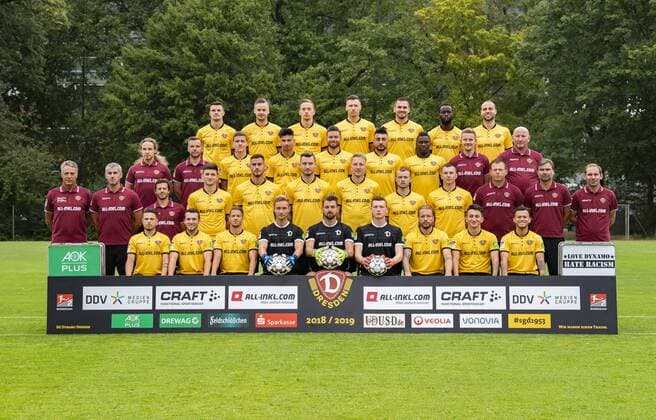 Team photo SG Dynamo Dresden 2 BL Portrait date 2018 2019 Friday 06 07 2018 Team photo Back row from left Philip Heise 16 Lucas Röser 9 Jannik Müller 18 Sören Gonther 26 Pascal Testroet 37 Erich Berko 40 Rico Benatelli 8 2 row from the top from the left Tobias Lange Alexander Schurig Physiotherapist Marius Hauptmann 35 Osman Atilgan 15 Niklas Kreuzer 7 Aias Aosman 10 Moussa Kone 14 Felix Schimmel Co Manager Dietmar Preußer Kit Manager 3 row from the top left Uwe Neuhaus Head Coach Peter Nemeth Co Coach Philippe Hasler Athletic Coach Jannis Nikolaou 4 Dario Dumic 3 Florian Ballas 23 Marco Hartmann 6 Brian Hamalainen 31 Haris Duljevic 11 Branislav Arsenovic Goalkeeping coach Matthias Lust Co Coach Sascha Lense Sports psychologist Bottom row from left Vasil Kusej 32 Justin Löwe 34 Patrick Möschl 22 Tim Boss 21 Patrick Wiegers 24 Markus Schubert 1 Patrick Ebert 20 Baris Atik 28 Sascha Horvath 29 RM001