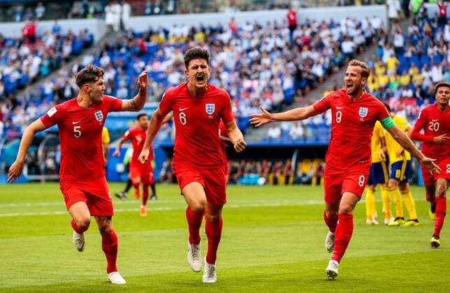 SAMARA, RUSSIA - JULY 7, 2018: England s John Stones, Harry Maguire and Harry Kane (L-R) celebrate scoring in the 2018 FIFA World Cup WM Weltmeisterschaft Fussball Quarterfinal match against Sweden at Samara Arena Stadium. Denis Tyrin TASS  TS088712
