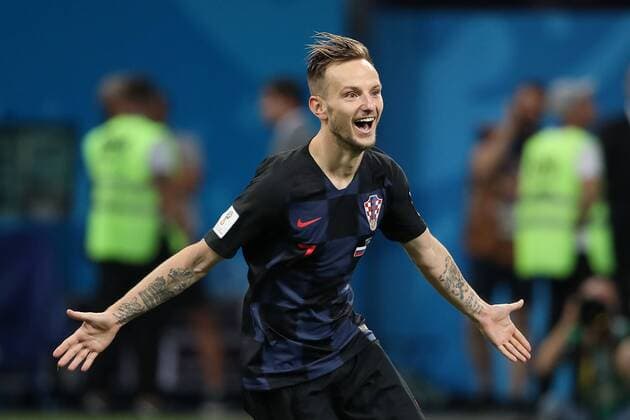 Sport-Bilder des Tages Ivan Rakitic of Croatia celebrates scoring the winning kick in the penalty shoot-out following the 2018 FIFA World Cup WM Weltmeisterschaft Fussball quarter-final match at Fisht Stadium in Sochi, Russia on July 7, 2018. Croatia beat Russia 4-3 on penalties to advance to the semi-finals.  SOC20180707107 CHRISxBRUNSKILL