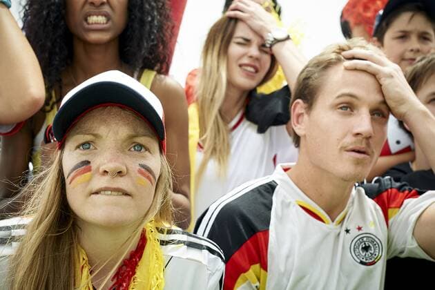 German football fans watching football match  Copyright: FrédéricxCirou B34162536