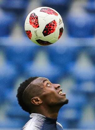 ST PETERSBURG, RUSSIA - JULY 9, 2018: Blaise Matuidi of the French national football team handles Telstar Mechta, the official match ball, during a training session at Saint Petersburg Stadium ahead of their 2018 FIFA World Cup WM Weltmeisterschaft Fussball semi-final match against Belgium. Peter Kovalev TASS  TS088C0C