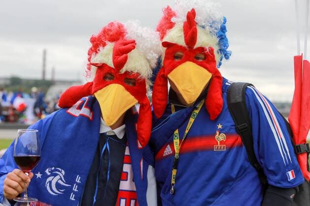 ST PETERSBURG, RUSSIA - JULY 10, 2018: Supporters of France dressed up as chickens at the French Fan House, Casa Blue, on Krestovsky Island, before a 2018 FIFA World Cup WM Weltmeisterschaft Fussball semifinal football match between France and Belgium. Sergei Konkov TASS  TS088D41