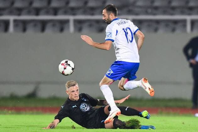 180710 Sören Rieks of Malmö FF slide tackles Xhevdet Shabani of Drita during the UEFA Champions League qualifying match between FC Drita and Malmö FF on July 10, 2018 in Pristina Photo Ludvig Thunman BILDBYRAN Code LT 92086  Copyright: LUDVIGxTHUNMAN BB180710LT044