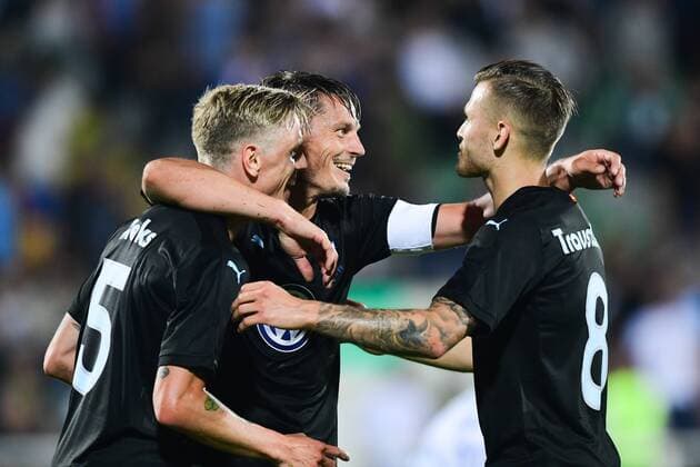 180710 Sören Rieks celebrates with Markus Rosenberg and Arnor Ingvi Traustason of Malmö FF after Rosenberg scored 0 3 during the UEFA Champions League qualifying match between FC Drita and Malmö FF on July 10, 2018 in Pristina Photo Ludvig Thunman BILDBYRAN Code LT 92086  Copyright: LUDVIGxTHUNMAN BB180710LT045