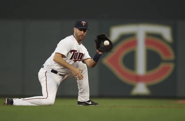 July 10, 2018 - Minneapolis, MN, USA - Minnesota Twins first baseman Joe Mauer fields a grounder by the Kansas City Royals Rosell Herrera in the fifth inning on Tuesday, July 10, 2018, at Target Field in Minneapolis. Kansas City at Minnesota - ZUMAm67_ 20180710_zaf_m67_046 Copyright: xJeffxWheelerx
