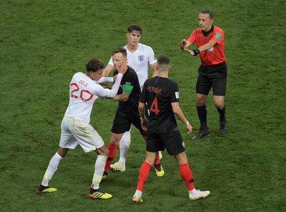 World Cup 2018 in Russia Croatia England 11 07 2018 Dele Alli ENG ranks with Ivan Rakitic above referee Cüneyt Cakir Turkey HM